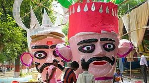 | Photo: PTI : Workers prepare effigies of demon king ‘Ravana’ ahead of the ‘Dussehra’ festival, in Patna, Tuesday, Oct. 13, 2026.