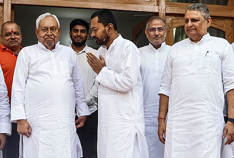 Bihar Health Minister Nishant Kumar with JD(U) National President Nitish Kumar before his departure for Nawada and Nalanda to campaign for the Bihar Legislative Council elections, in Patna, Bihar.