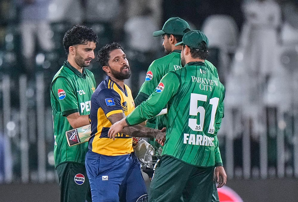 Sri Lanka's Kusal Mendis, second left, shakes hand with Pakistan's Sahibzada Farhan on the end of the third T20 cricket match between Pakistan and Sri Lanka, in Rawalpindi, Pakistan, Tuesday, Oct. 13, 2026. 
 - | Photo: AP/Anjum Naveed