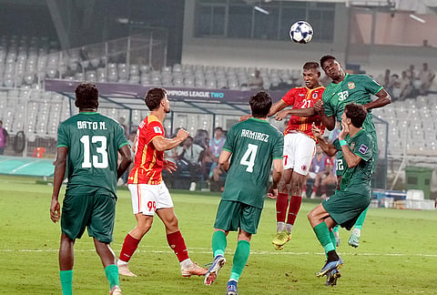 East Bengal FC player contests for a header against opposition defender during the AFC Champions League Two football match, in Kolkata, Tuesday, Oct. 13, 2026. 