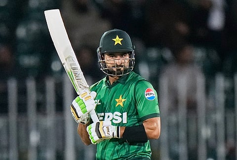 Pakistan's Sahibzada Farhan celebrates after scoring fifty runs during the third T20 cricket match between Pakistan and Sri Lanka, in Rawalpindi, Pakistan, Tuesday, Oct. 13, 2026. 