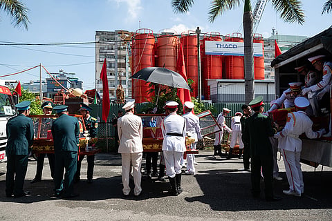 Military personnel carry the remains of 731 martyrs' remains found at Le Thi Rieng Cultural Park for burial at Ho Chi Minh City Martyrs' Cemetery Wednesday, Oct. 14, 2026, in Ho Chi Minh City, Vietnam.