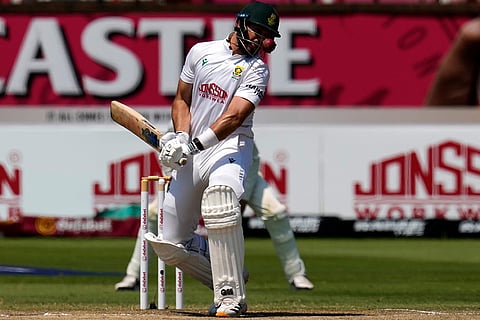 South Africa's Aiden Markram avoids a raising ball on day five of the first cricket test match between South Africa and Australia, in Durban, South Africa, Tuesday, Oct. 13, 2026.