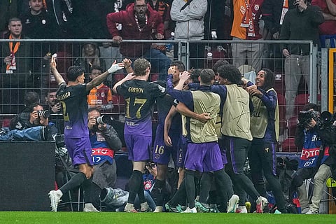 Barcelona's players celebrate after teammate Fermin Lopez scored their side's second goal during the Champions League opening phase soccer match between Galatasaray and Barcelona in Istanbul, Turkey, Tuesday, Oct. 13, 2026.