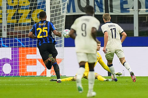 Brugge's Romeo Vermant, right, scores his side's fourth goal during the Champions League opening phase soccer match between Inter Milan and Club Brugge in Milan, Italy, Tuesday, Oct. 13, 2026.