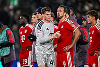 | Photo: Carina Johansen/NTB via AP : Bayern Munich's Harry Kane and goalkeeper Jonas Urbig react after the Champions League opening phase soccer match between Viking and Bayern Munich in Stavanger, Norway, Tuesday Oct. 13, 2026. 