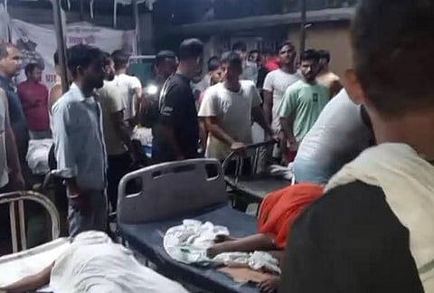 People gather at a local hopital after a boat capsized in the Ganga river, with several people feared drowned, in Bihar's Vaishali district on Tuesday, Oct. 13, 2026.
