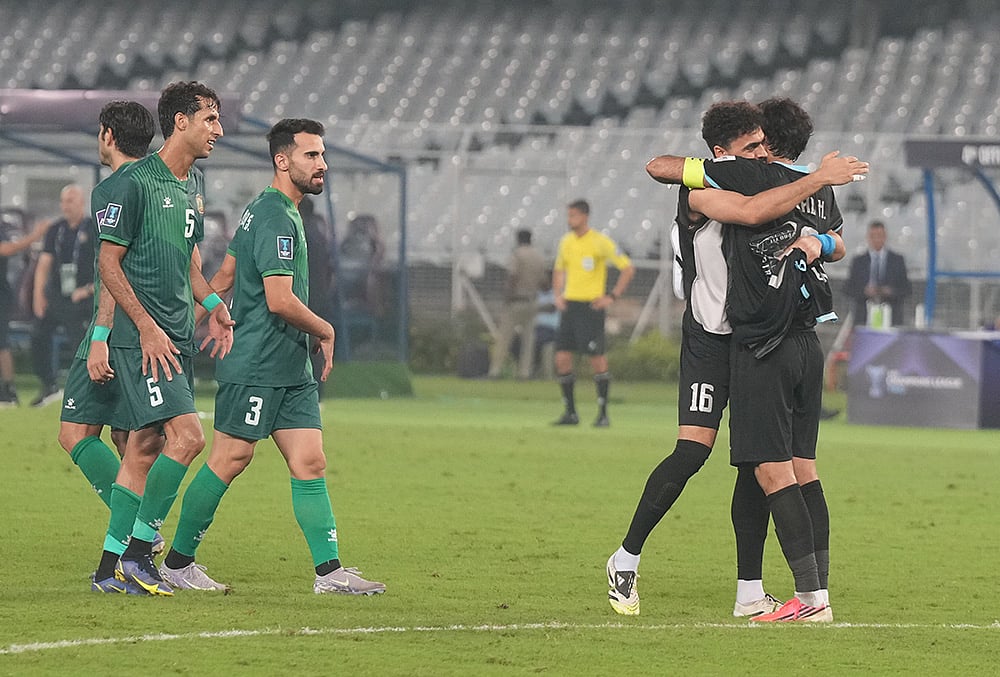 Al Shorta FC players greet each other after winning the the AFC Champions League Two football match, in Kolkata, Tuesday, Oct. 13, 2026.  - | Photo: PTI/Swapan Mahapatra