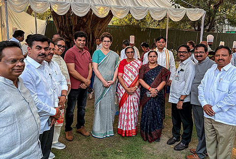 Congress MP Priyanka Gandhi Vadra in a photograph with INDIA bloc leaders during a high tea organised at LoP Rahul Gandhi’s residence, to discuss the strategy for joint protests against ‘vote chori’ (vote theft) and to press for Chief Election Commissioner Gyanesh Kumar's resignation, in New Delhi. 