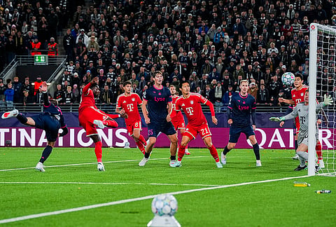 Viking's Herman Haugen, left, scores his side's third goal during the Champions League opening phase soccer match between Viking and Bayern Munich in Stavanger, Norway, Tuesday Oct. 13, 2026. 