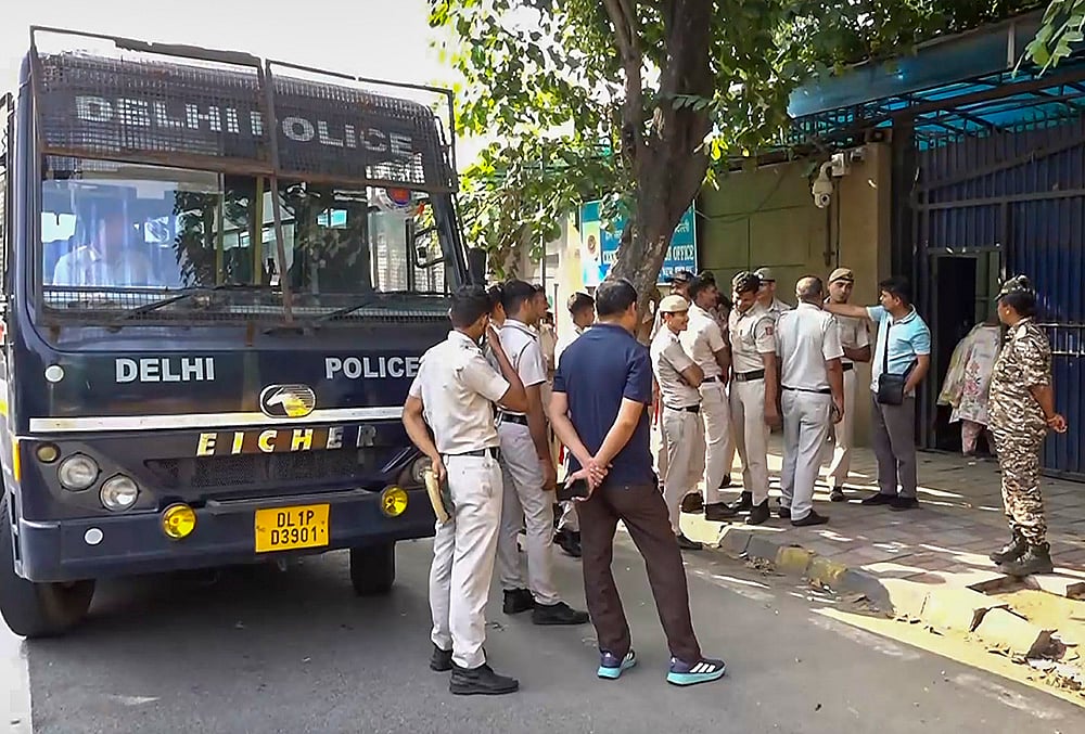 Police personnel outside the Tihar Jail, in New Delhi. Cockroach Janta Party (CJP) leaders Saurav Das and Ashutosh Ranka were sent to five-day judicial custody and lodged in Tihar Jail on Wednesday for allegedly violating their peace bonds and trespassing into Jantar Mantar, which was denotified as a protest area, police sources said.  - | Photo: PTI 