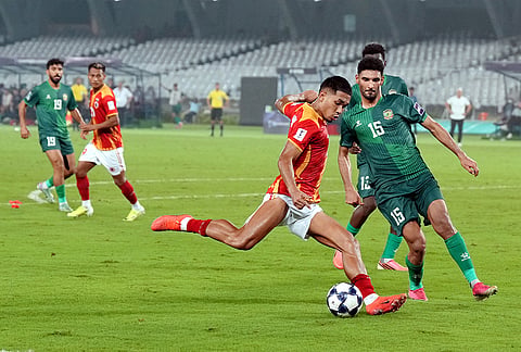 East Bengal FC player and Al Shorta FC player vie for the ball during the AFC Champions League Two football match, in Kolkata, Tuesday, Oct. 13, 2026. 