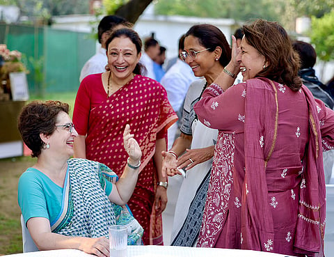 Congress leader Priyanka Gandhi Vadra interacts with party leaders Aradhana Misra-Mona, Supriya Shrinate and NCP (SP) leader Supriya Sule during a high tea organised for the INDIA bloc leaders at Rahul Gandhi’s residence, to discuss the strategy for joint protests against ‘vote chori’ (vote theft) and to press for Chief Election Commissioner Gyanesh Kumar's resignation, in New Delhi. 
