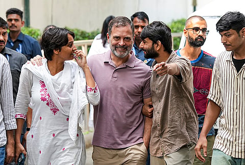 Congress leader Rahul Gandhi with content creator Ramit Verma, NSUI members and other protesters, who were allegedly injured amid crackdown by police in the recent protests against Chief Election Commissioner (CEC) Gyanesh Kumar, arrive to address a press conference after their meeting, in New Delhi, Wednesday, Oct. 14, 2026. 

