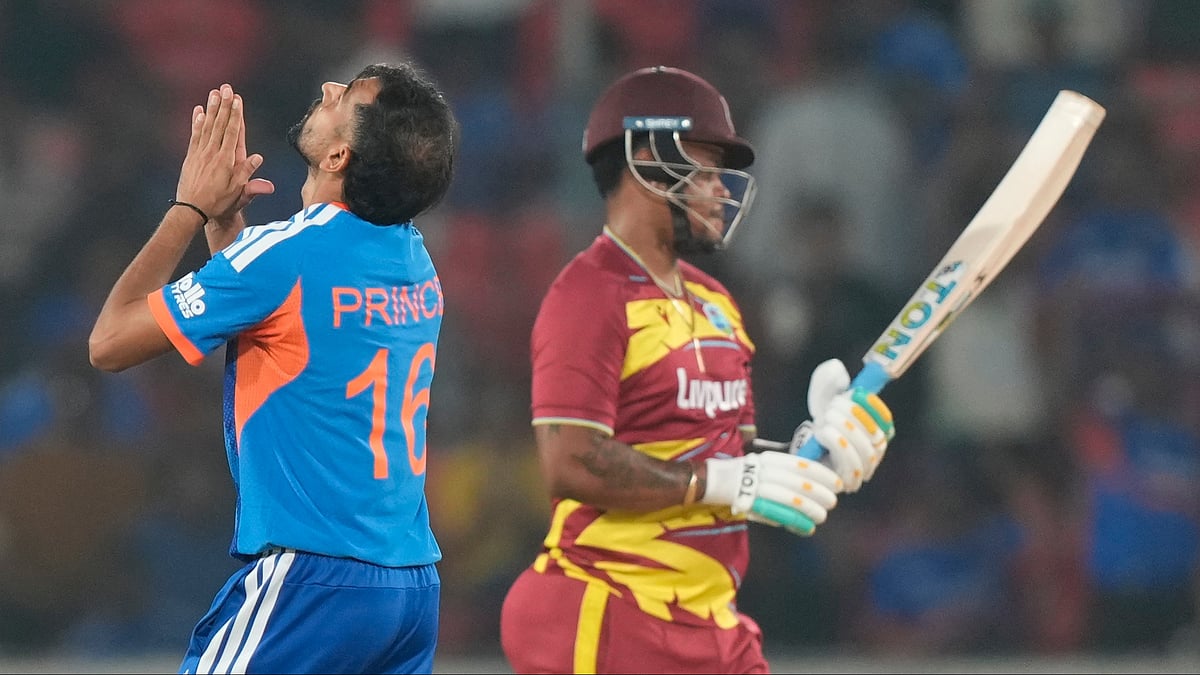 (AP Photo/Mahesh Kumar A.) : Indias Prince Yadav, left, celebrates the wicket of West Indies Shimron Hetmyer, right, during the fourth T20 cricket match between India and West Indies in Hyderabad, India, Wednesday, Oct. 14, 2026