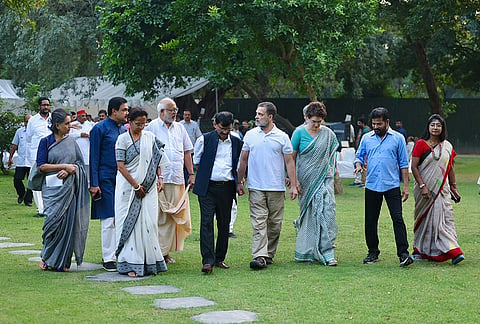 Lok Sabha LoP Rahul Gandhi with party leader Priyanka Gandhi Vadra, Telangana CM Revanth Reddy, JMM leader Mahua Majhi, NCP (SP) leader Supriya Sule and others during a high tea organised for the INDIA bloc leaders at his residence, to discuss the strategy for joint protests against ‘vote chori’ (vote theft) and to press for Chief Election Commissioner Gyanesh Kumar's resignation, in New Delhi. 