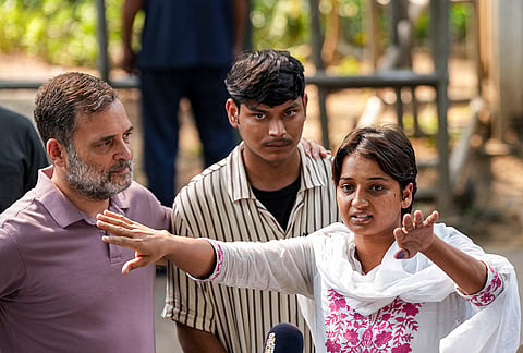 Congress leader Rahul Gandhi with NSUI members and other protesters, who were allegedly injured amid crackdown by police in the recent protests against Chief Election Commissioner (CEC) Gyanesh Kumar, during a press conference after their meeting, in New Delhi, Wednesday, Oct. 14, 2026. 