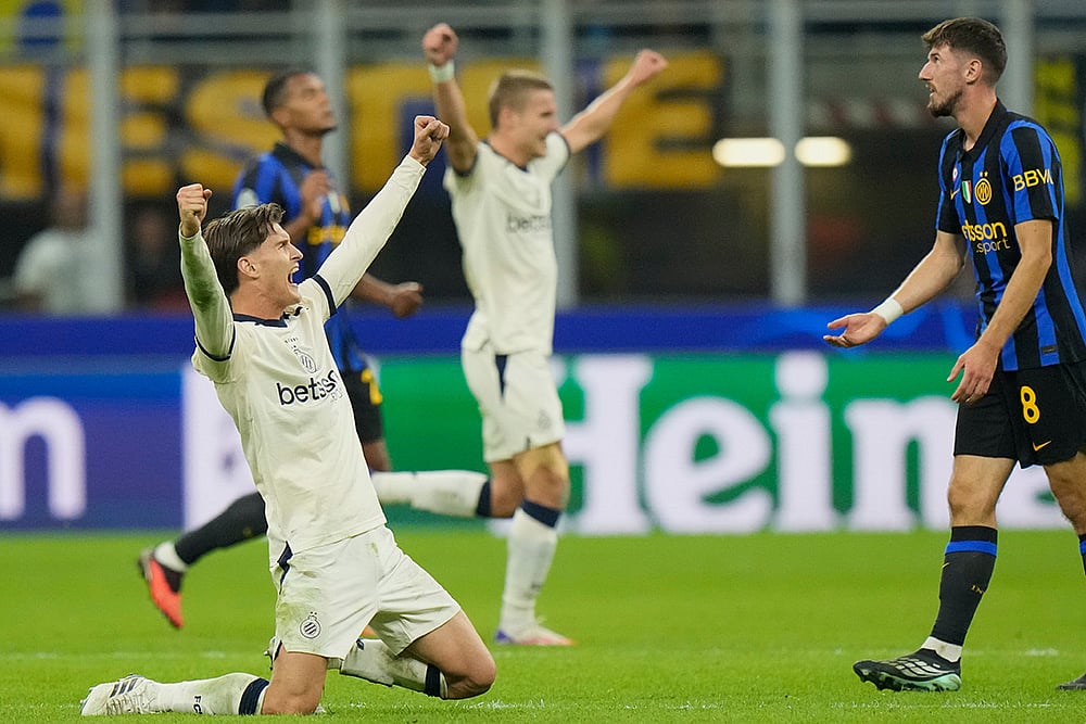 Brugge's Freddie Potts, left, celebrates after winning the Champions League opening phase soccer match between Inter Milan and Club Brugge in Milan, Italy, Tuesday, Oct. 13, 2026. - | Photo: AP/Luca Bruno