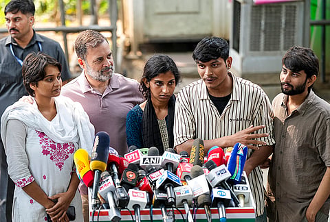 Congress leader Rahul Gandhi with NSUI members and other protesters, who were allegedly injured amid crackdown by police in the recent protests against Chief Election Commissioner (CEC) Gyanesh Kumar, during a press conference after their meeting, in New Delhi, Wednesday, Oct. 14, 2026. 