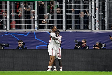 Liverpool's Bradley Barcola, left, celebrates with Jeremie Frimpong after scoring his side's fifth goal during the Champions League opening phase soccer match between LASK and Liverpool in Linz, Austria, Wednesday, Oct. 14, 2026.