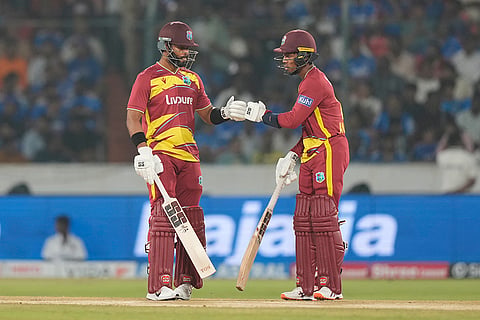 West Indies' captain Shai Hope, left, and Jewel Andrew greet each other during the fourth T20 cricket match between India and West Indies in Hyderabad, India, Wednesday, Oct. 14, 2026.