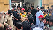 Peshawar School Roof Collapse Kills 29, Injures Over 40 In Pakistan AP Photo/Arif Khan : A rescue worker carries an injured child after rescuing him from the rubble of a roof collapse at a private school, in Peshawar
