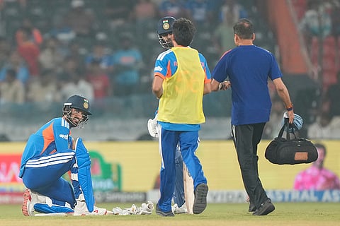 India's Arshdeep Singh, left, reacts after a ball hits him during the fourth T20 cricket match between India and West Indies in Hyderabad, India, Wednesday, Oct. 14, 2026.