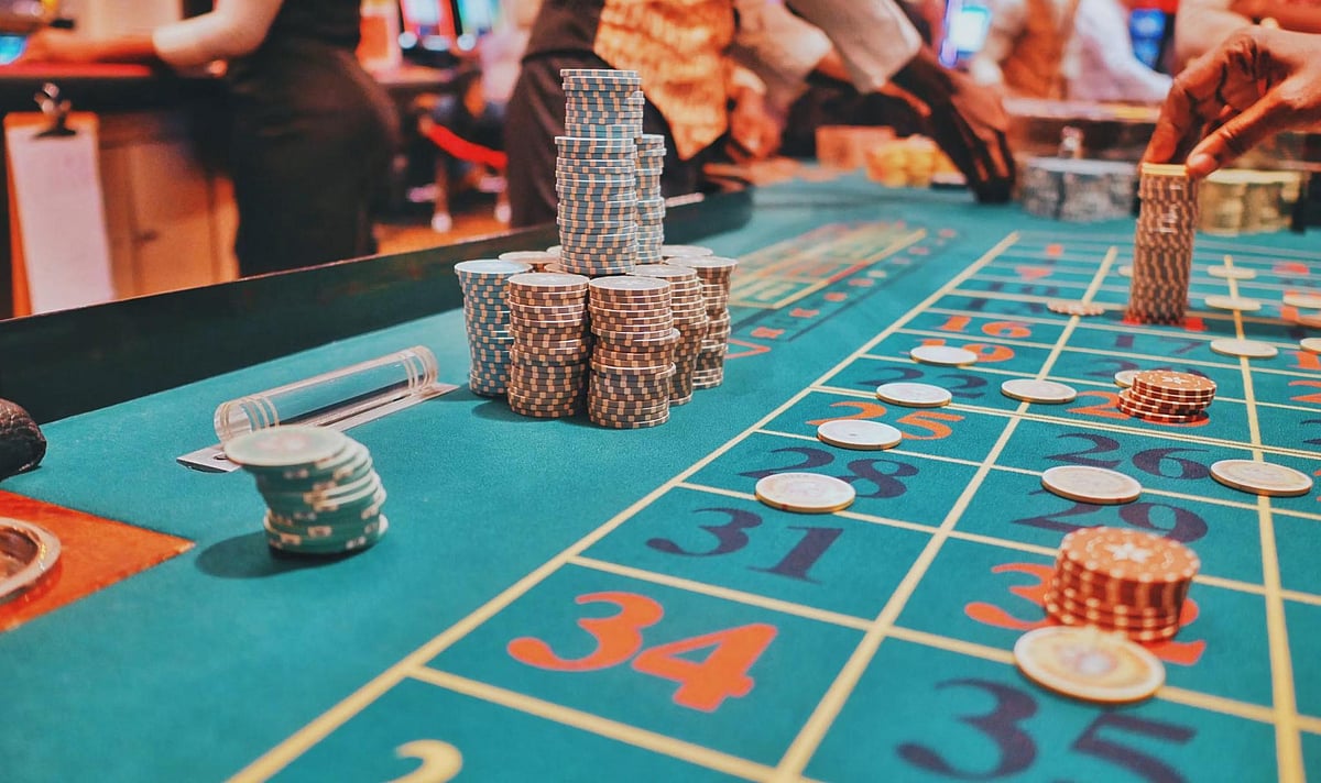 Stacks of betting chips on a roulette table grid