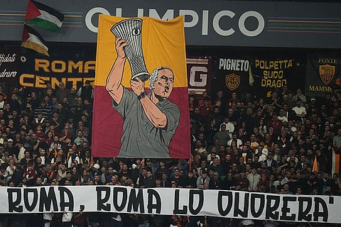 A banner depicting Real Madrid's head coach Jose Mourinho is displayed by Roma fans during a Champions League opening phase soccer match between Roma and Real Madrid, in Rome, Wednesday, Oct.14, 2026.
