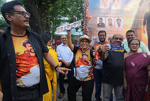 Fans of Indian superstar Rajinikanth, arrive to watch the screening of his latest film "Jailer 2," at a cinema hall in Mumbai, India, Thursday, Oct. 15, 2026. 