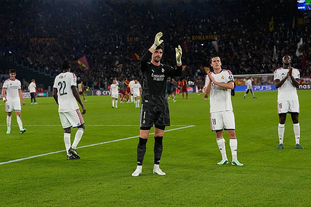 Real Madrid players celebrate at the end of a Champions League opening phase soccer match between Roma and Real Madrid, in Rome, Wednesday, Oct.14, 2026. - | Photo: AP/Alessandra Tarantino