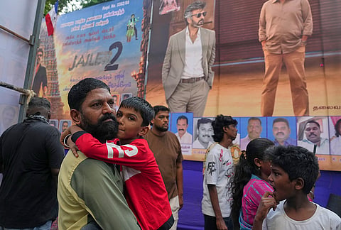 Fans of Indian superstar Rajinikanth, arrive to watch the screening of his latest film "Jailer 2," at a cinema hall in Mumbai, India, Thursday, Oct. 15, 2026.