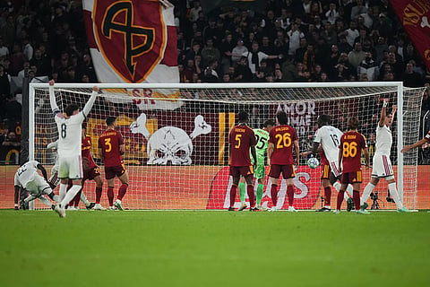 Real Madrid's Antonio Rudiger, left, scores his side's fourth goal during a Champions League opening phase soccer match between Roma and Real Madrid, in Rome, Wednesday, Oct.14, 2026.