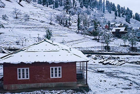 A view of a snow-covered area after heavy snowfall, at Machil Sector in Kupwara, Jammu and Kashmir.