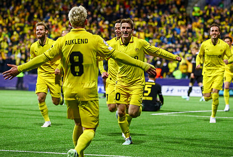 Bodo's Fredrik Sjovold celebrates after scoring during the Champions League soccer match between Bodo/Glimt and Borussia Dortmund in Bodo, Norway, Wednesday, Oct. 14, 2026.
