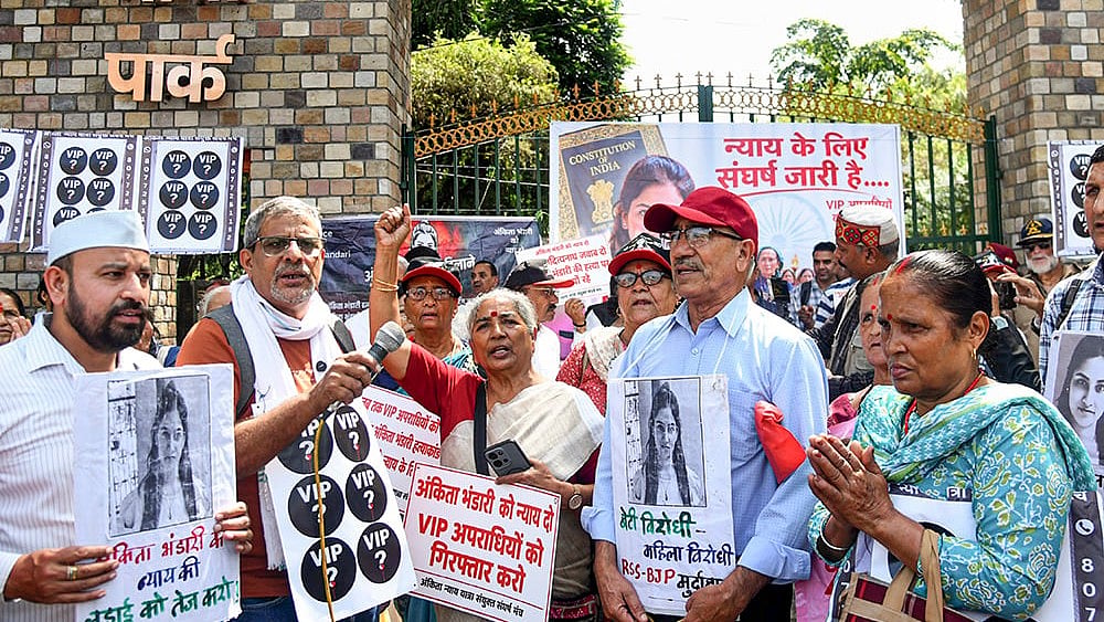 Members of various social organisations stage a protest demanding justice in the Ankita Bhandari murder case, outside Gandhi Park, in Dehradun, Uttarakhand. - | Photo: PTI 