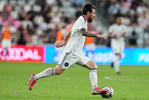 Inter Miami forward Lionel Messi runs with the ball during the second half of an MLS soccer match against New York City FC, Wednesday, Oct. 14, 2026, in Miami. 