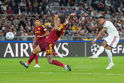 Real Madrid's Kylian Mbappe scores his side's first goal during a Champions League opening phase soccer match between Roma and Real Madrid, in Rome, Wednesday, Oct.14, 2026.