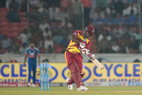 West Indies' Sherfane Rutherford plays a shot during the fourth T20 cricket match between India and West Indies in Hyderabad, India, Wednesday, Oct. 14, 2026.