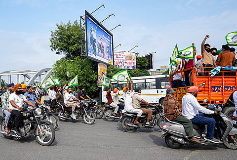 Farmers stage a protest during 'Punjab Bandh' called over the recent murder of anti-drug activist Parvinder Singh Jhota, in Amritsar, Punjab.