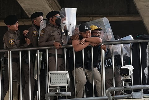 Police officers push protesters during a demonstration march to the International Monetary Fund and the World Bank Group meetings in Bangkok, Thailand, Thursday, Oct. 15, 2026. 