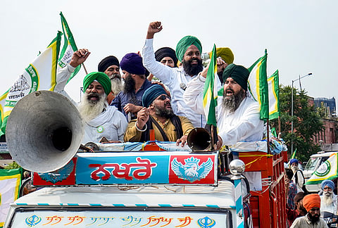 Farmers stage a protest during 'Punjab Bandh' called over the recent murder of anti-drug activist Parvinder Singh Jhota, in Amritsar, Punjab.