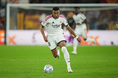 Real Madrid's Kylian Mbappe controls the ball during a Champions League opening phase soccer match between Roma and Real Madrid, in Rome, Wednesday, Oct.14, 2026.