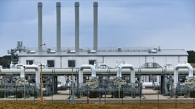 Gas pipes, connections, equipment and pressure reducers at the site of Gazprom's Nord Stream 2 Pipeline Landing in Germany - Shutterstock