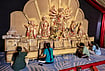 In Photos: Poetry, Coal Mines And Calendars Inspire Durga Puja Pandals | Photo: PTI : Children prepare installations at a committee Durga Puja 'pandal' themed on Bengali Literature amid the ongoing festival, in Jaipur, Rajasthan, Thursday, Oct. 15, 2026.