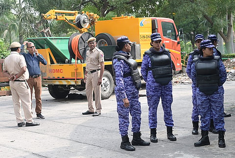 Security personnel keep a vigil ahead of the Cockroach Janta Party's proposed 'Lehra Do Tiranga' march at the Central Park in Connaught Place, in New Delhi, Friday, Oct. 16, 2026. 