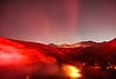 In Photos | California Wildfires Rage Through Malibu Hills As Crews Fight Flames From Ground And Air | Photo: AP/Jae C. Hong : Hot spots glow across a hillside during the Bryson Fire in Malibu, California.