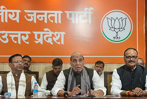 Union Defence Minister Rajnath Singh addresses a press conference, at BJP headquarters, in Lucknow. Uttar Pradesh Deputy Chief Minister Brajesh Patahk, right, and state BJP President Pankaj Chaudhary also seen. 