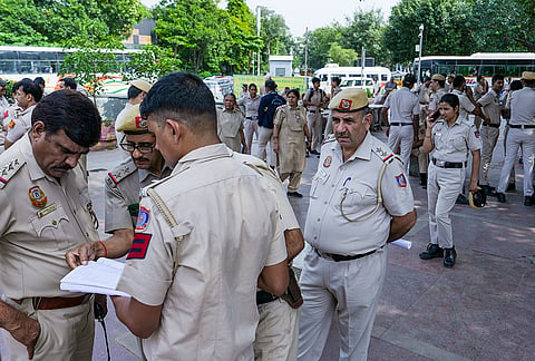 Police personnel gather ahead of the Cockroach Janta Party's (CJP) 'Lehra Do Tiranga' rally, at Connaught Place in New Delhi, Friday, Oct. 16, 2026. 