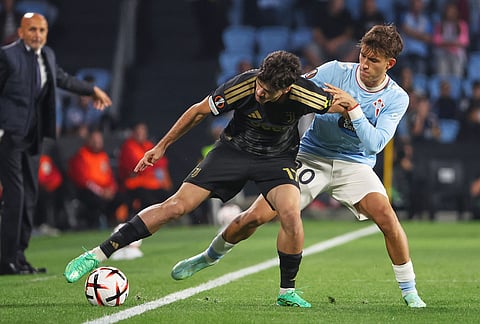Celta's Javi Rodriguez, right, challenges for the ball with Juventus' Kerim Alajbegovic during the Europa League soccer match between Celta Vigo and Juventus in Vigo, Spain, Thursday, Oct. 15, 2026. 